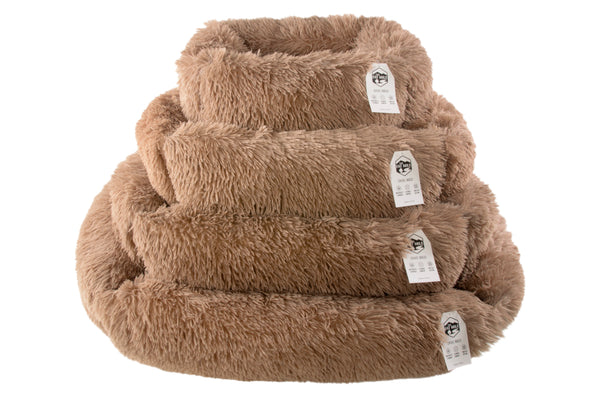 A brown square donut-shaped pet bed made of plush material, displayed with The Fat Mile tags attached to it.