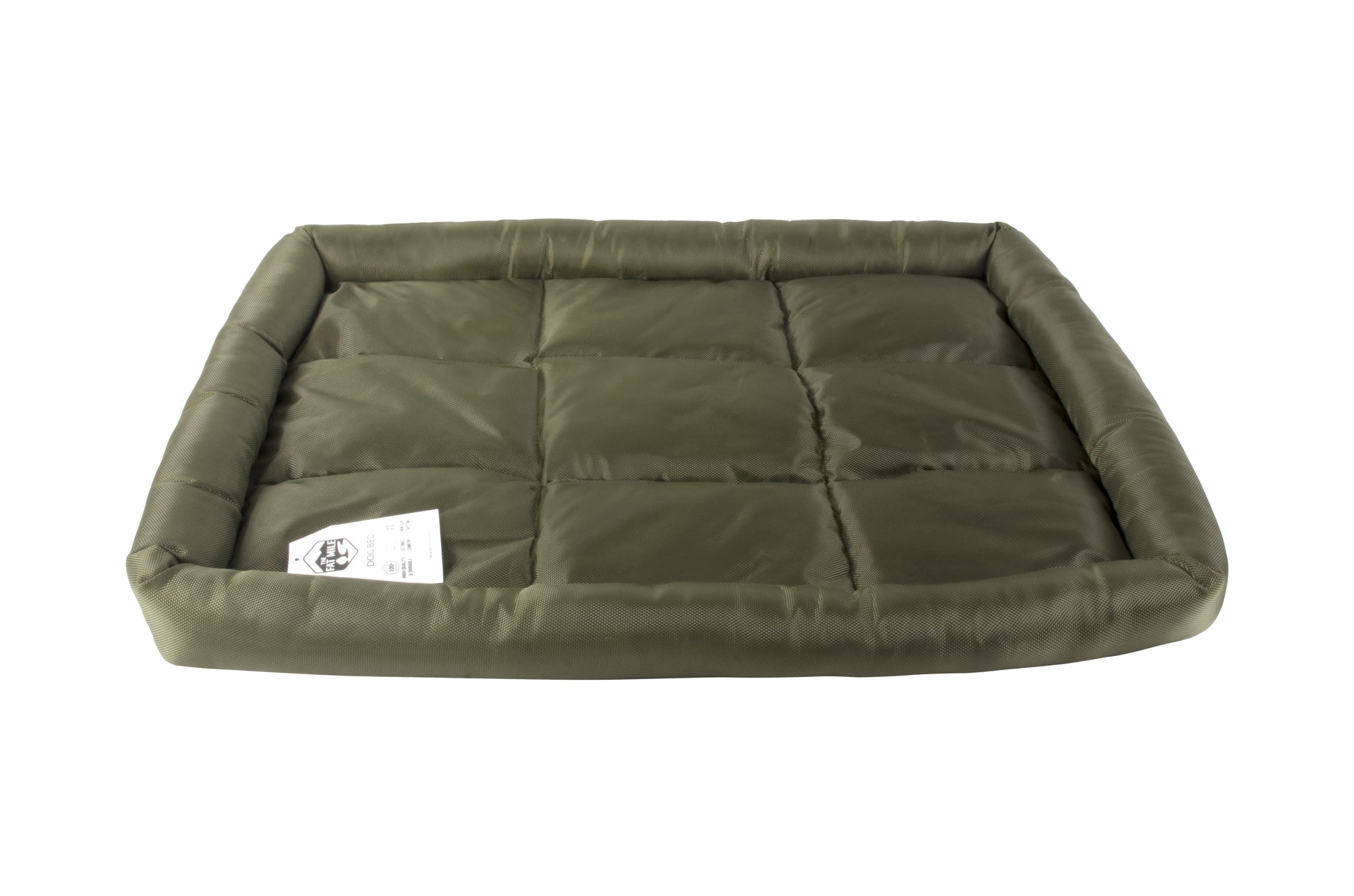A waterproof dog crate bed in green color. The Fat Mile tag attached.
