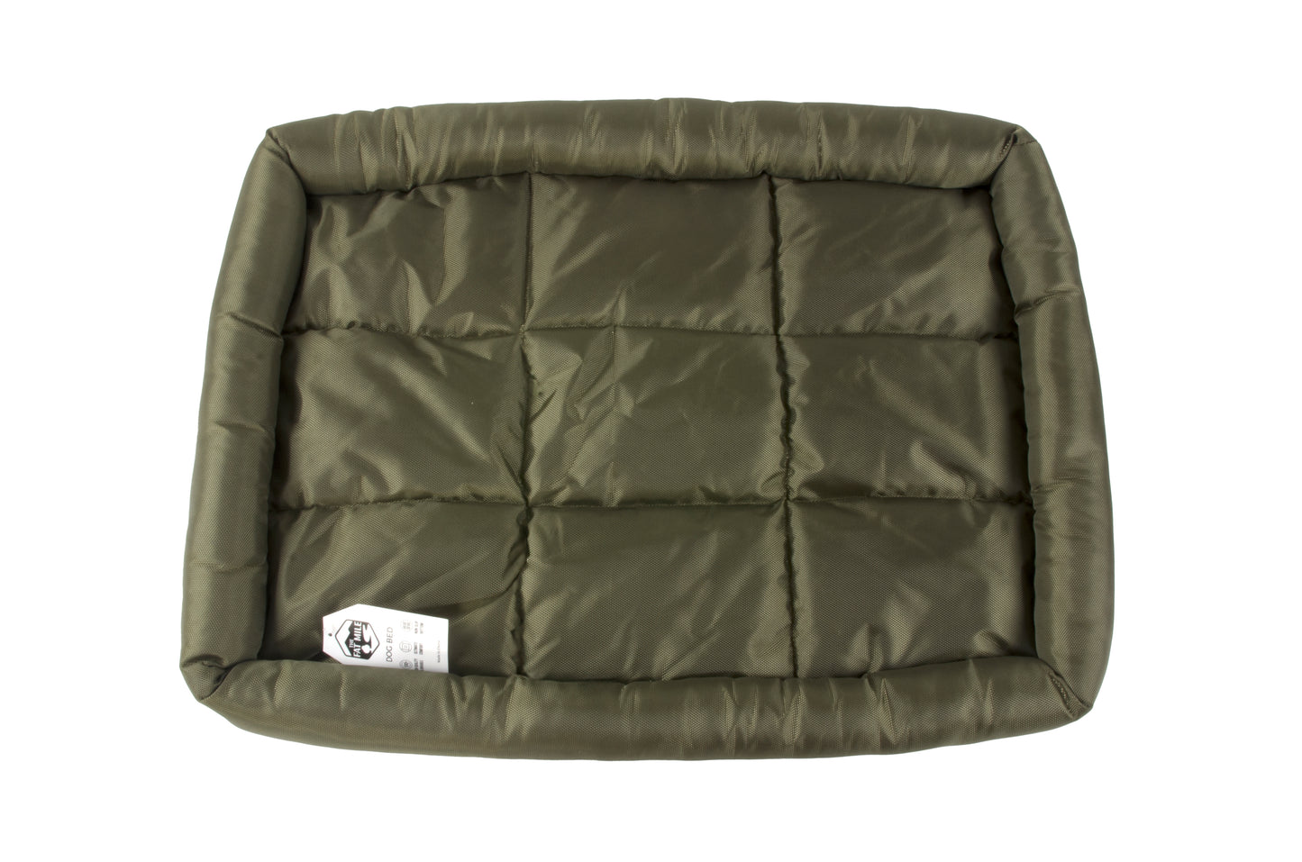 A waterproof dog crate bed in green color. The Fat Mile tag attached.