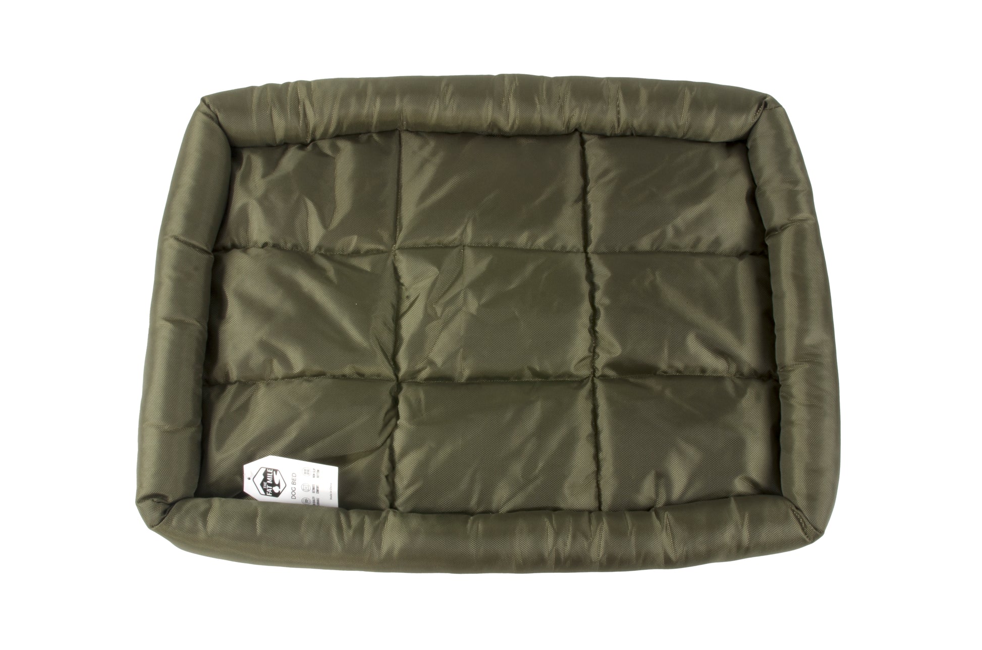 A waterproof dog crate bed in green color. The Fat Mile tag attached.