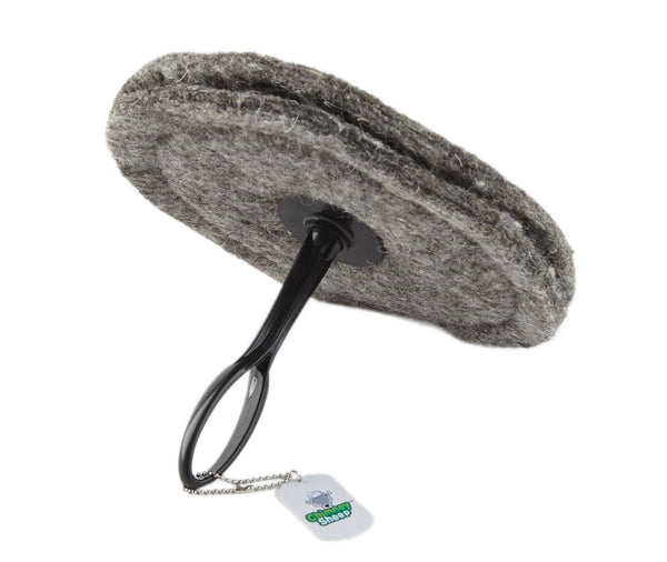 A gray 10" round chimney sheep with a handle and extension rod, laying sideways.