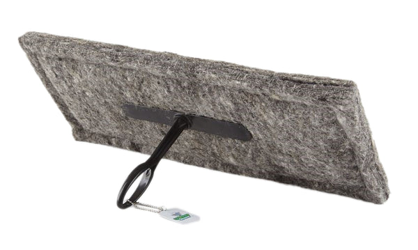 A gray 6"x16" chimney sheep with a handle and extension rod, laying sideways.