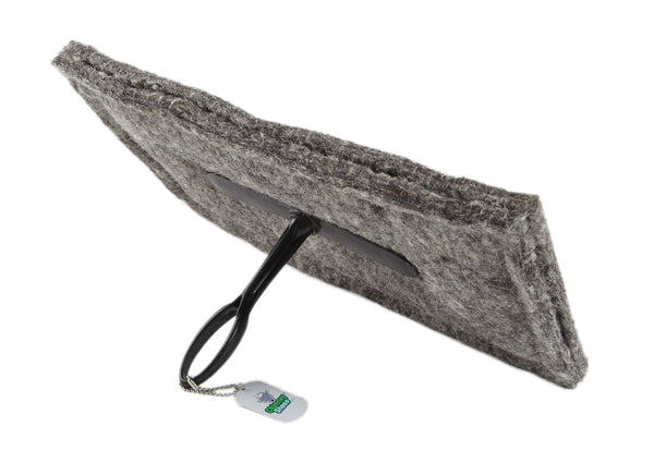 A gray 16"x9" chimney sheep with a handle and extension rod, laying sideways.