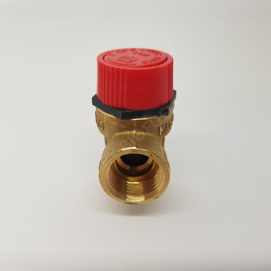A gold-colored brass pressure relief valve with a red cap and black sealing mechanism.
