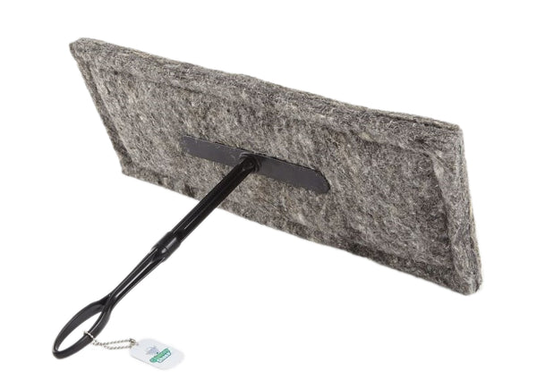 A gray 8"x20" chimney sheep with a handle and extension rod, laying sideways.