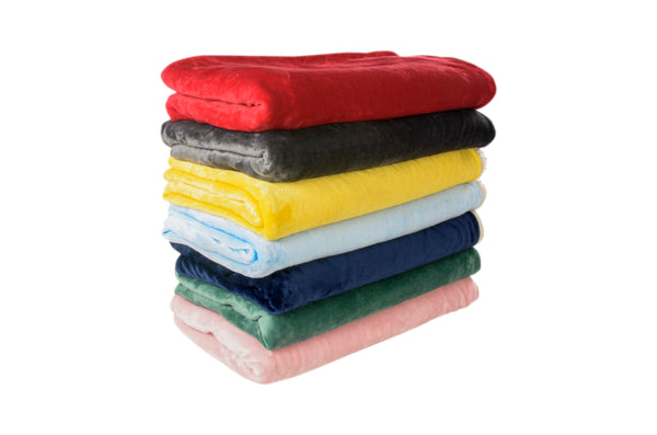 A stack of folded dog blankets in various colors including red, grey, yellow, light blue, navy, dark green and pink.