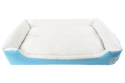 A set of cooling dog beds in blue and white colours, designed with a deep sleeping contour. Cool to the touch. A The Fat Mile logo on the right side.